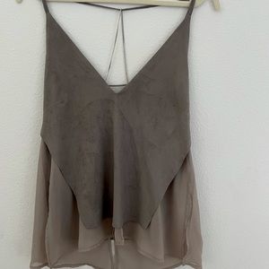 Low cut V blouse with metal detail in the back